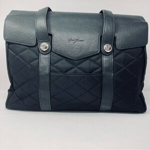 Quilted over the shoulder brief case.